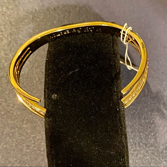 BCBGenerations Gold Tone Cuff Bracelet with Set In Clear Rhinestones - Picture 2 of 10